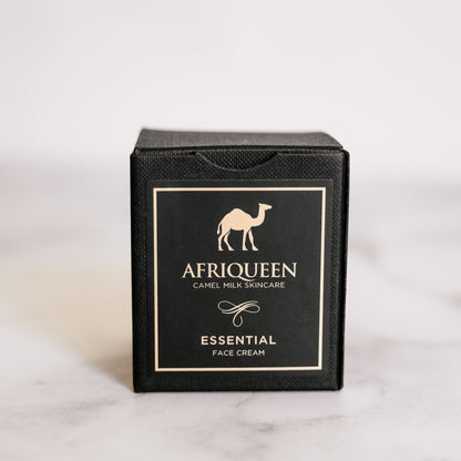 Black box of Afriqueen Essential Face Cream on a light gray background