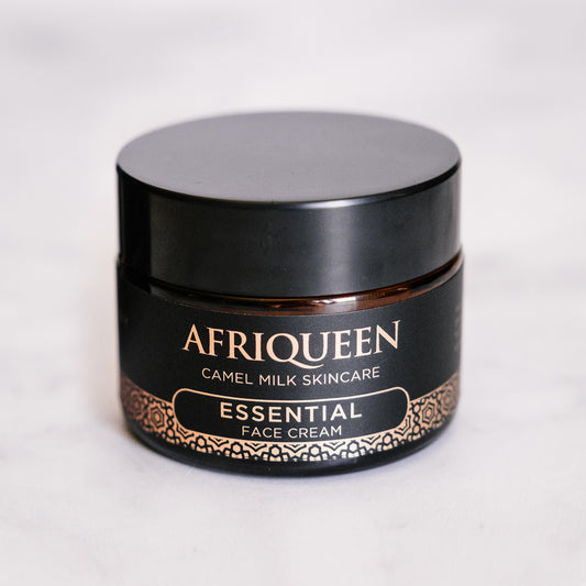 Black jar of Afriqueen Essential Face Cream on a white background