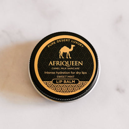 Afriqueen lip balm container on a white background