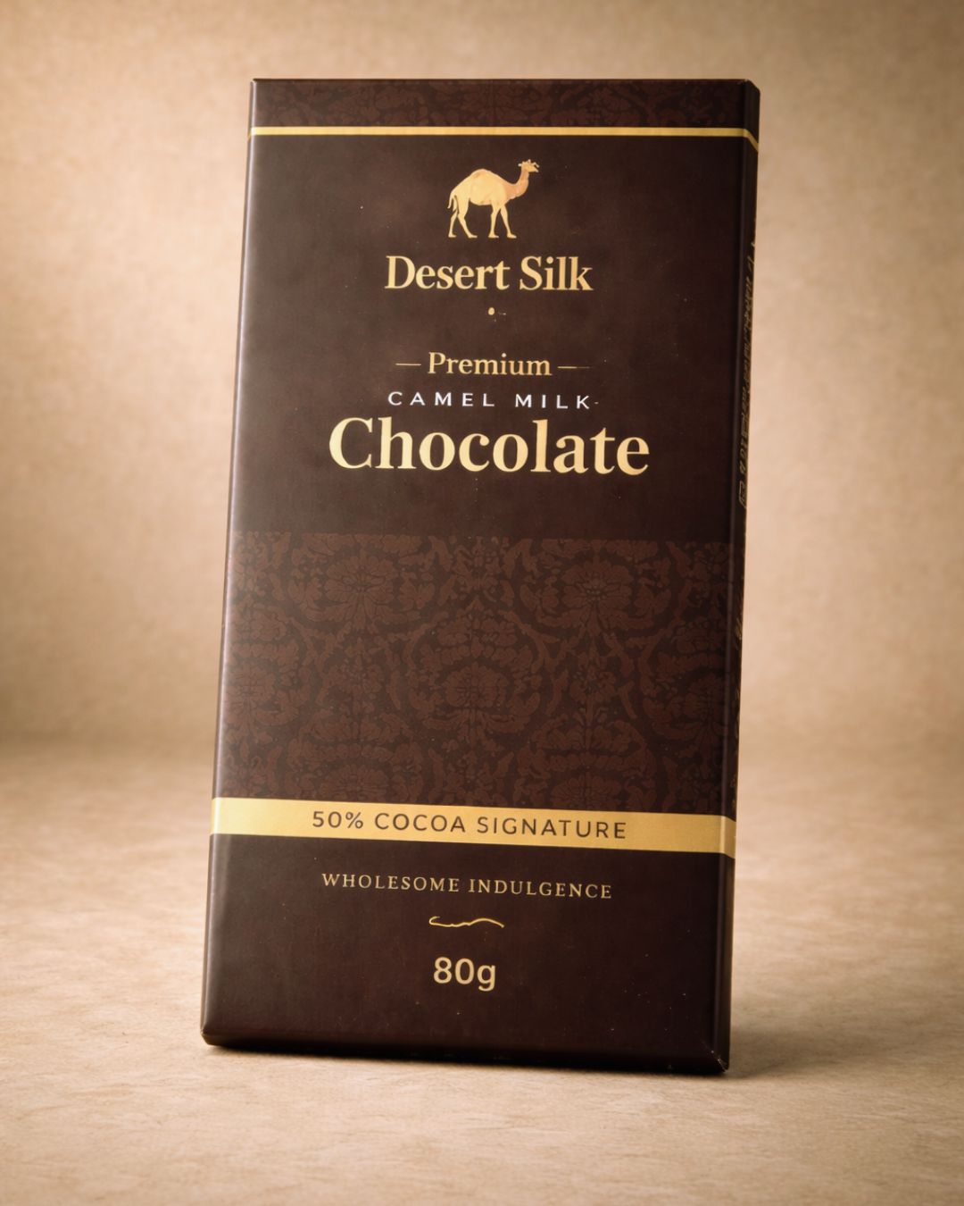 Desert Silk Premium Camel Milk Chocolate packaging on a beige background