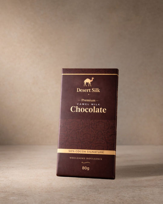 Desert Silk Premium Camel Milk Chocolate packaging on a beige background